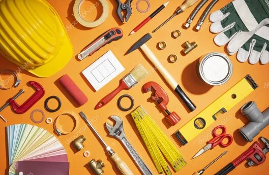 Technician testing electrical equipment in a workshop